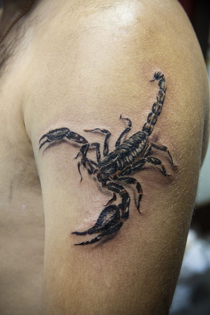 Скорпион-тату может обозначать, что перед вами наркоман