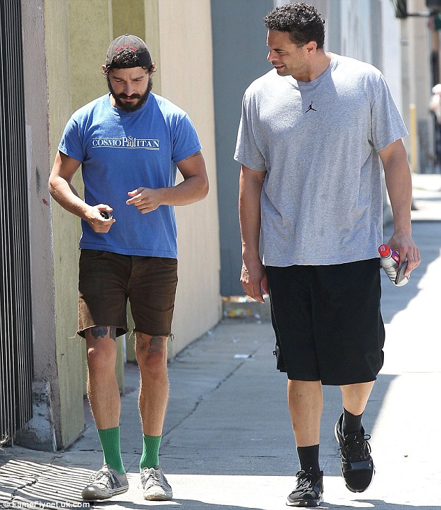 Hanging out: Shia seemed to be friendly on the outing as he was spotted with another male chum