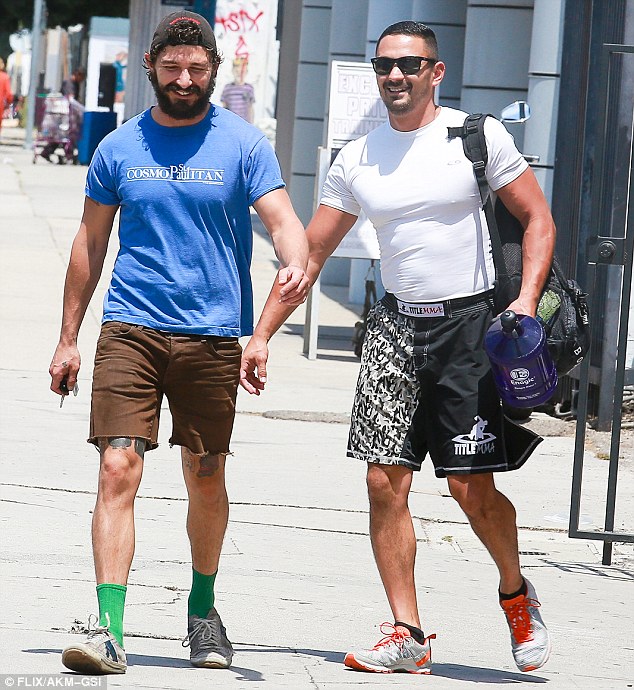 Workout buddies? He was reportedly leaving the gym in LA as he walked out with a pal in athletic wear