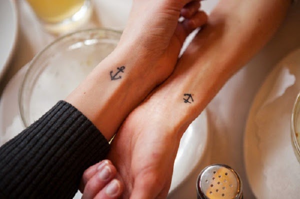 matching small anchor tattoos