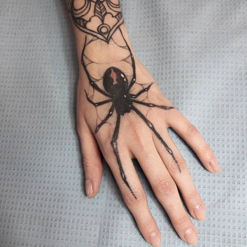 Что означает татуировка паука д