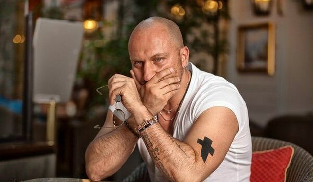 Татуировка крест Дмитрия Нагиева