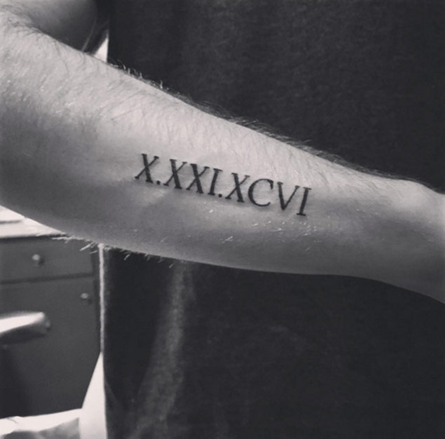 Roman Numeral Tattoo on Forearm by Cameron