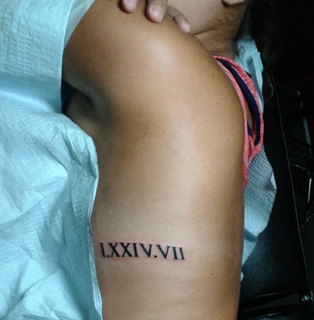 Roman Numeral Tattoo on Side by Enoc