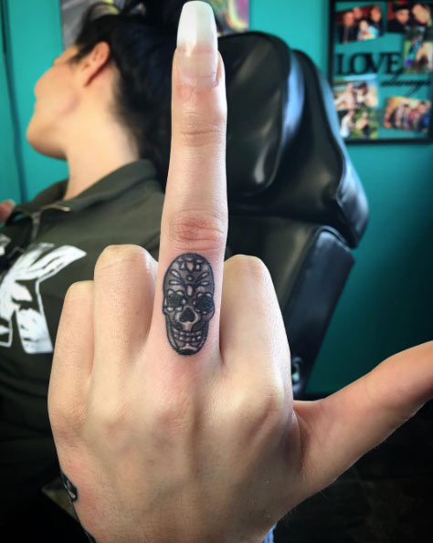 Skull Finger Tattoo by Richie Nigro