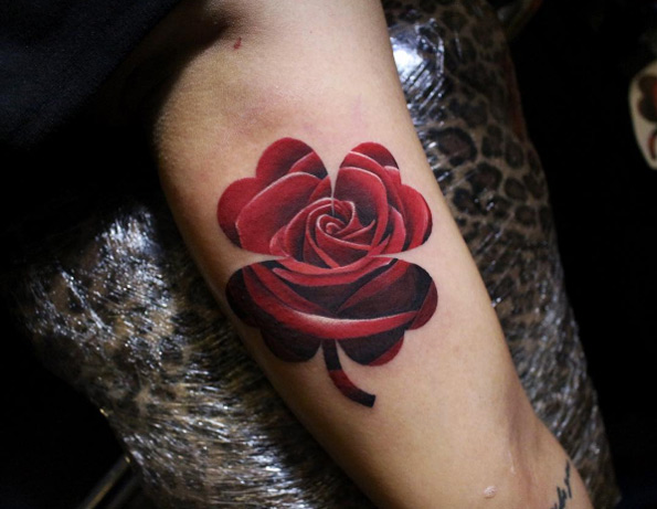 Rose four leaf clover tattoo by Sakda Benmart