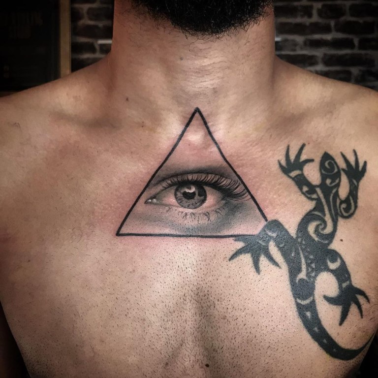 глаз в треугольнике значение тату