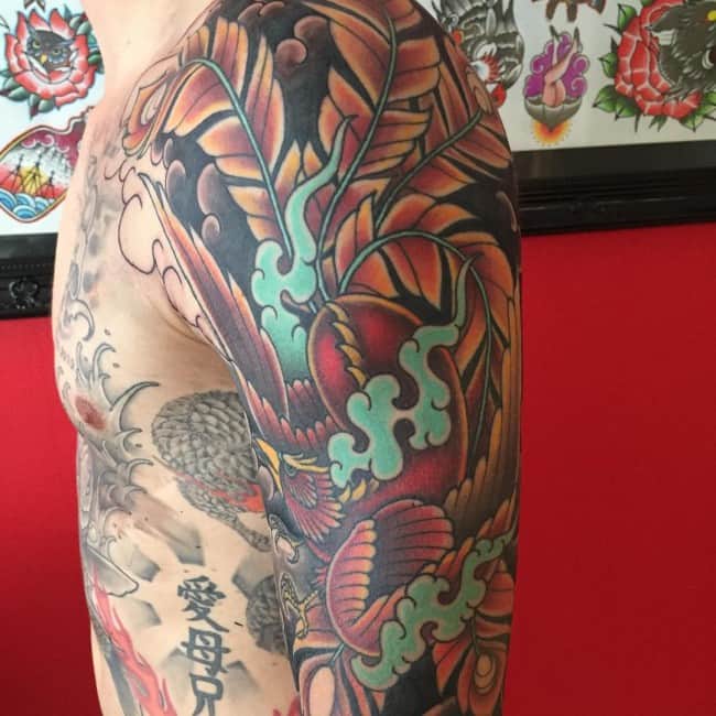 phoenix tattoo on upper arm