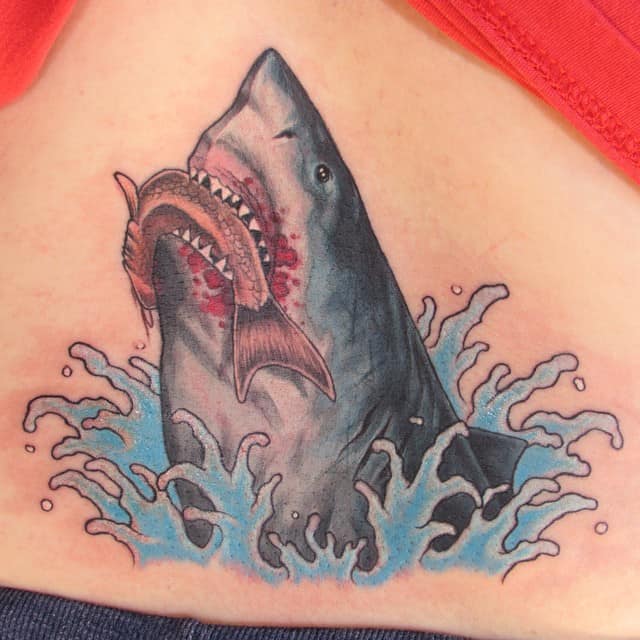 lower back tattoo of shark