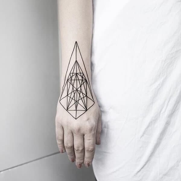 geometric hand tattoo