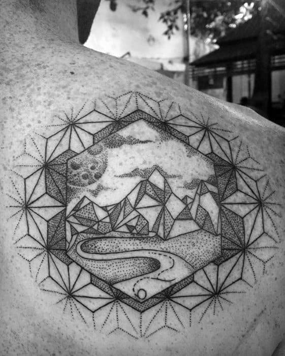 geometric mountain tattoo on back