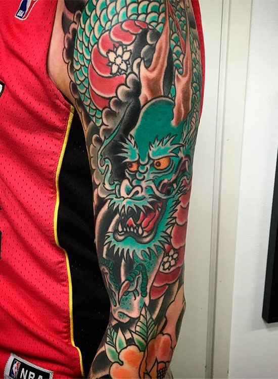 Татуировка дракона на руке