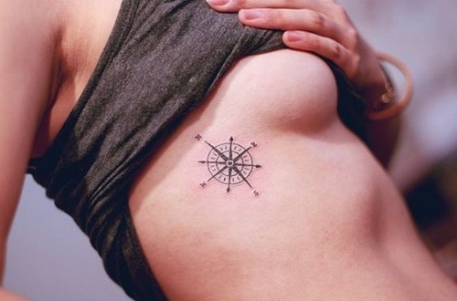 Small Compass Tattoo Below the Breast